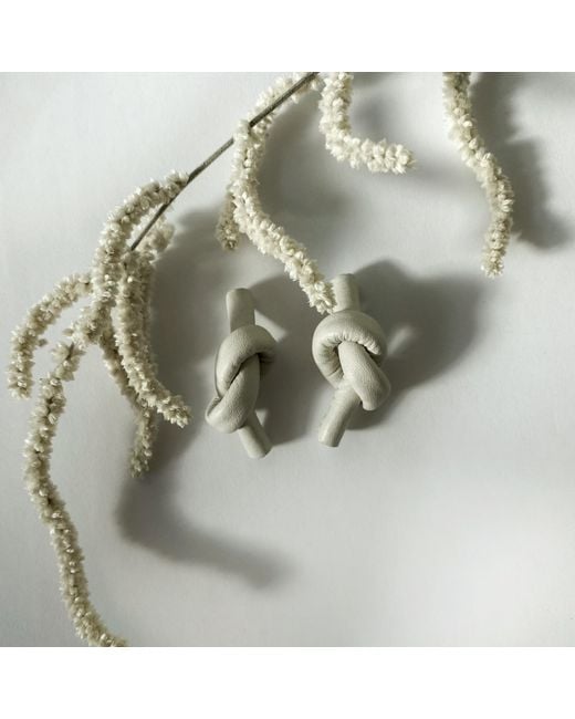 WAIWAI Metallic Ivory Knot Leather Earrings