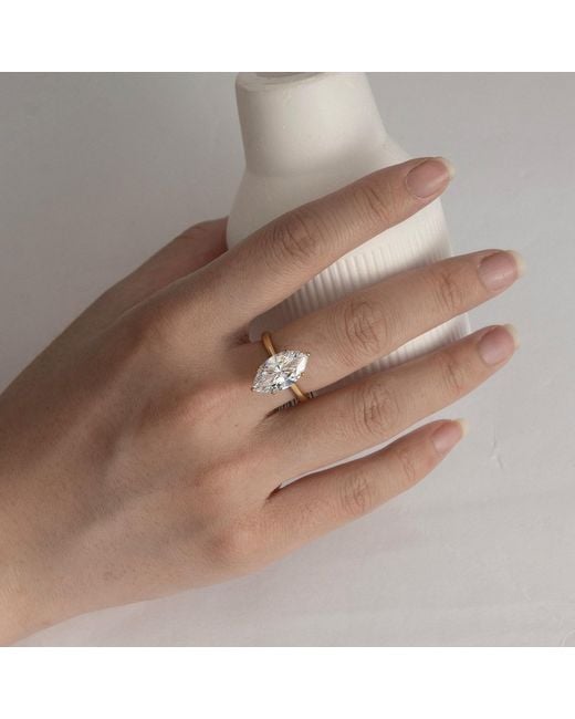 Diamonbliss Metallic Five Carats Marquise Cut Solitaire Cocktail Ring