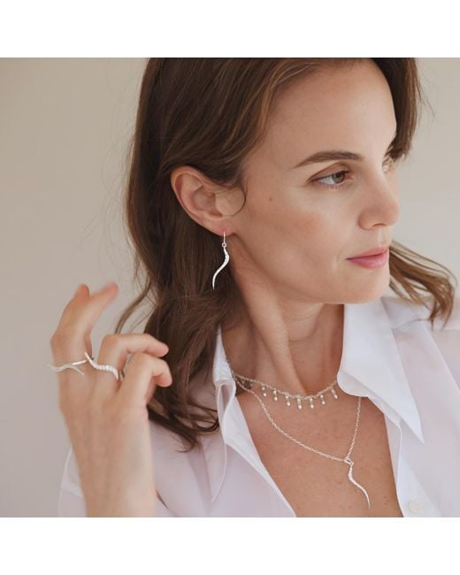 Linda Fiore Metallic Swirl Earrings With Clear Cz