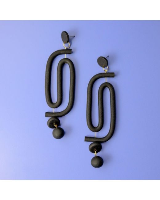 By Chavelli Black Labyrinth Dangly Statement Earrings