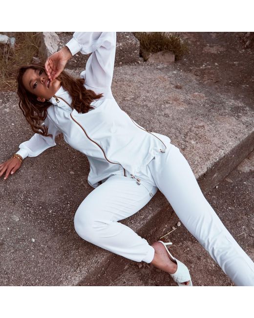 ANTONINIAS White Elegant Panacea Tracksuit Jacket With Golden Details And Chiffon Sleeves