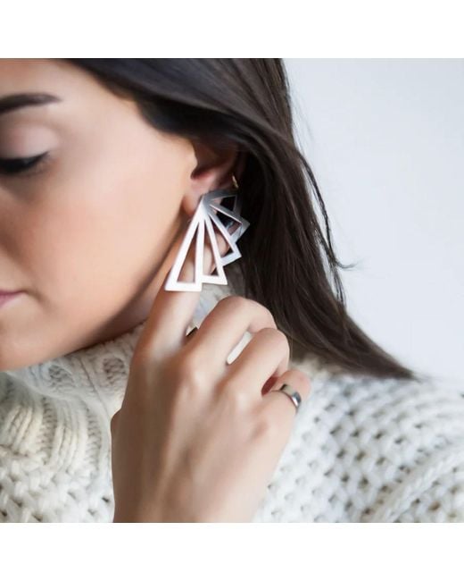 LINYA JEWELLERY White Asymmetrical Earrings
