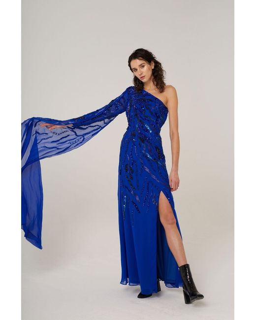 Raishma Blue Astrid A One Shoulder With A Dramatic To-The-Floor Draped Georgette Train, Falling From The Shoulder Gown