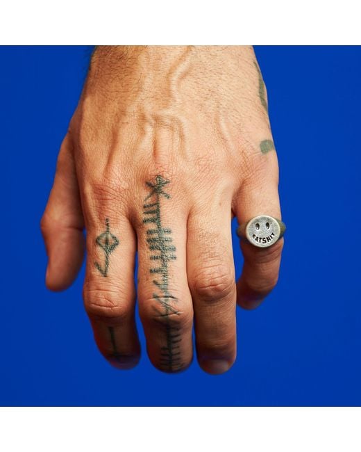 Cartography Metallic Eat Shit Smiley Ring for men