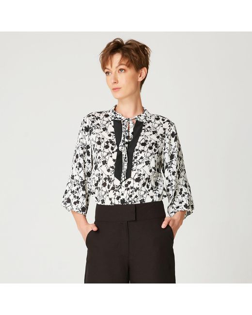 Smart and Joy Black Tulip Sleeves Blouse With Monochrome Floral Print