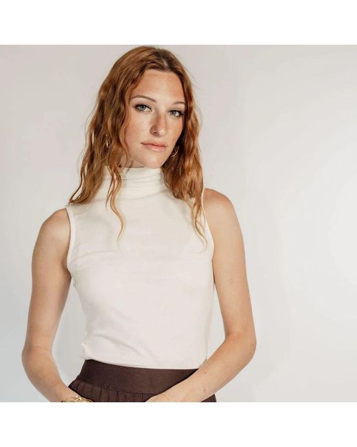 Rave on Trend White Neutrals Sleeveles Turtleneck