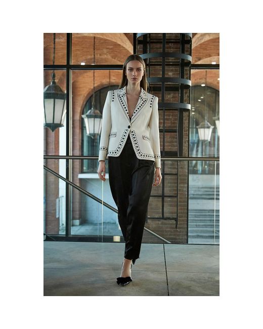 The Extreme Collection White Blazer With Bold Stud Accents