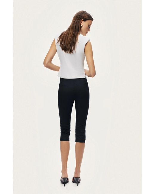 Nocturne White Sleeveless Buckle-Detail Blouse