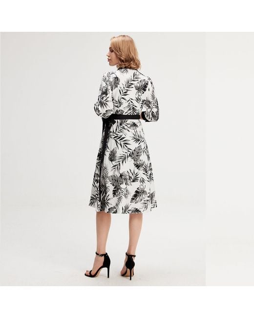 Smart and Joy Black Bi-Material Wrap Dress With Tropical Print
