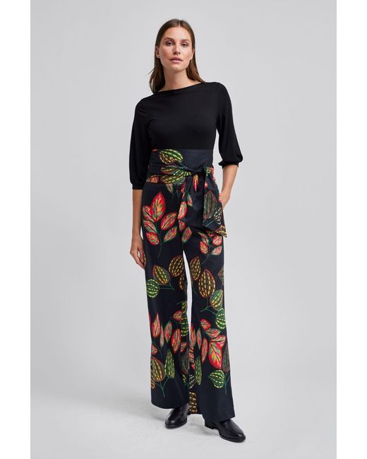 Marianna Déri Black Wide-Leg Trousers With Leaf Print And Tie Belt