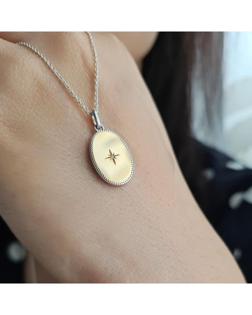 Janus Edinburgh Metallic Oval Star Shield Reversible Necklace