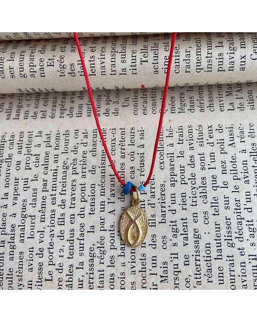 The Pheia Metallic String Fish Necklace