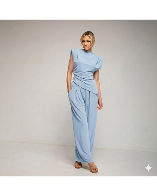 Tantra Spain Sl Blue Set Of Straight Trousers And Side Pockets. Short Sleeve Top With Asymmetrical Length