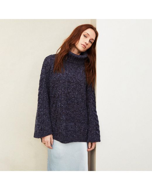 Roll neck outlet tunic jumper