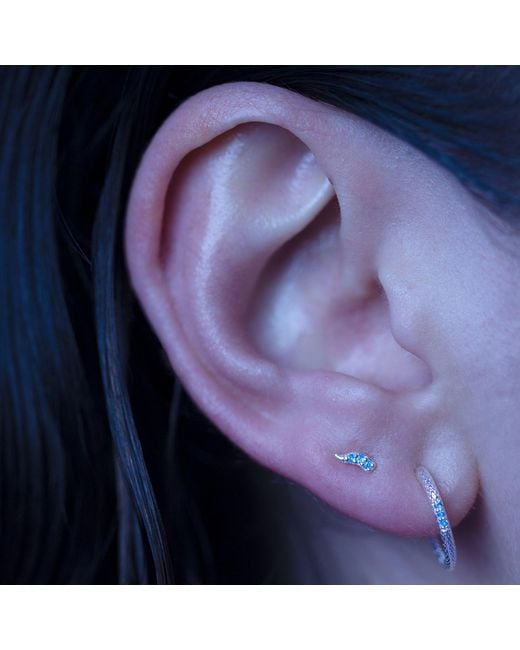 NASI SILVER White Fishtail Studs- Topaz