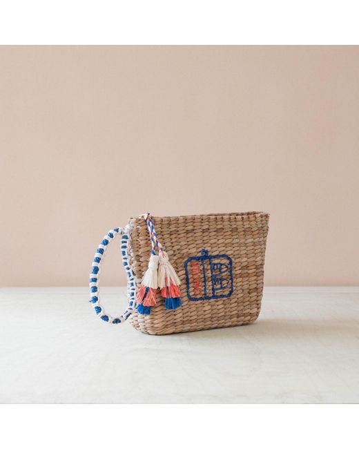 LIKHÂ Brown Neutrals Handwoven Seagrass Sardine Can Wristlet Pouch With Tassels