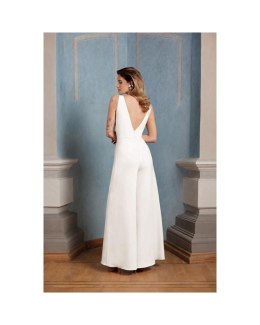 Nomi Fame White Primrose Deep V-Neck Creamy Palazzo Jumpsuit