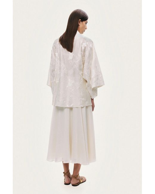 Nocturne White Flowy High-Waisted Midi Skirt