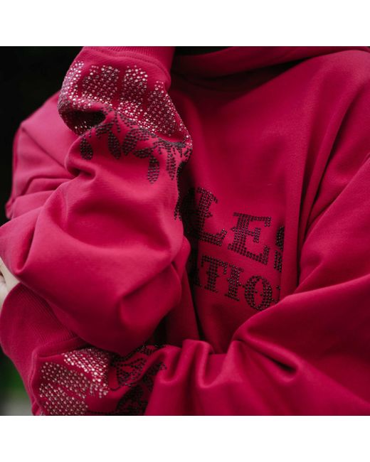 Miracles Manifester Red Positive Affirmation Hoodie With Rhinestone Design