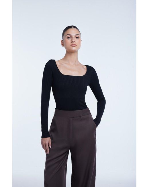 Dāl the Label Blue Ribbed Long Sleeve Bodysuit
