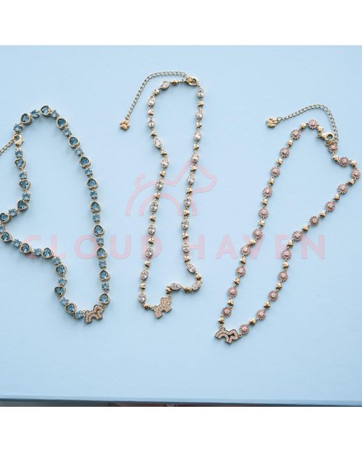 Cloud Haven Metallic Crystal Daisy Logo Necklace