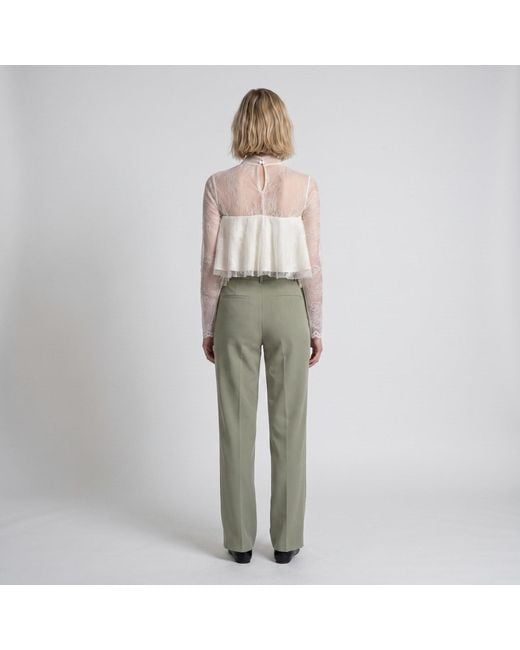 Modenaire White Lace Overlay Crop Top With Sheer Long Sleeves And Bow Tie Detail