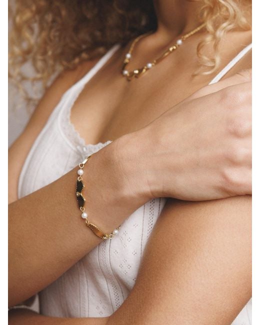 Déclarer Metallic Wings Of Love Bracelet