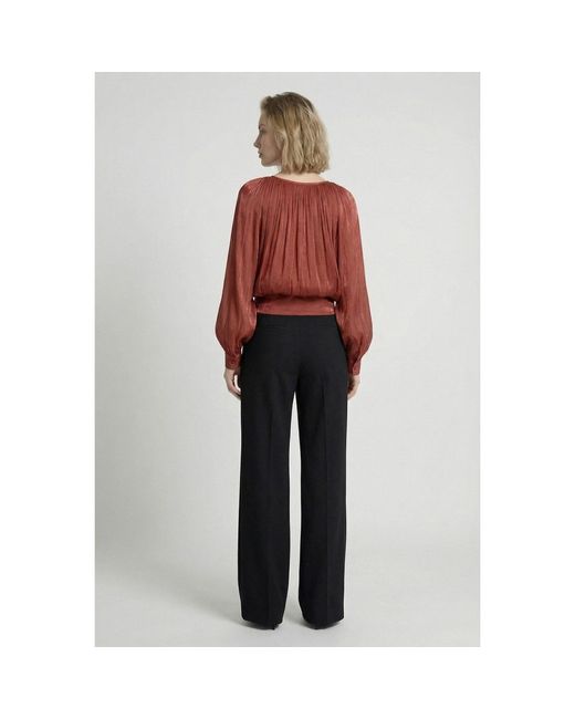 Modenaire Brown Gathered Tie-Neck Blouse With Blouson Silhouette And Waist Tie
