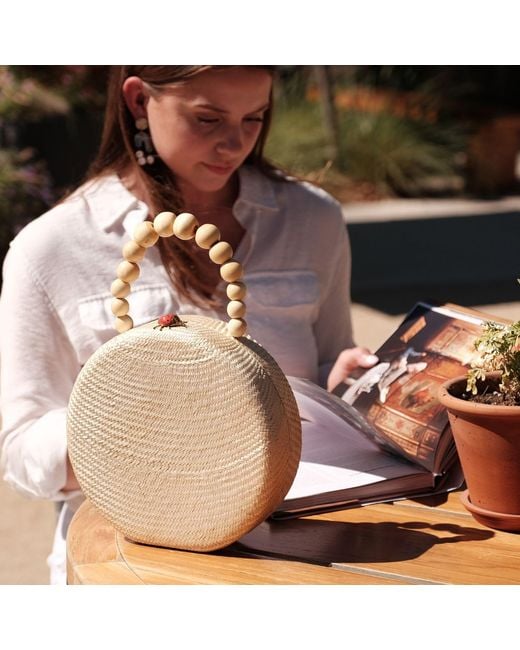 LIKHÂ Natural Oat Round Classic Handbag With Bead Handle