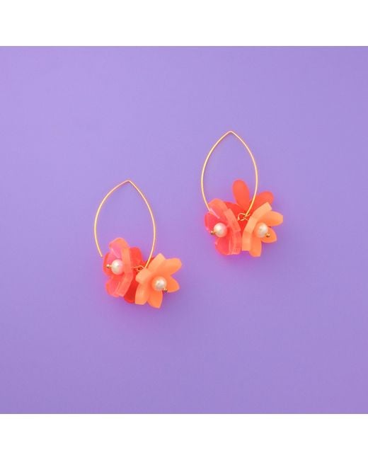 By Chavelli Pink Flowerball Dangly Earrings
