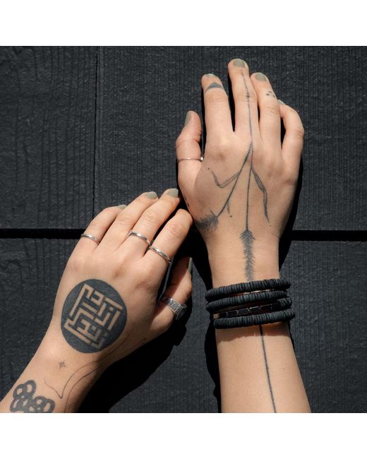 WAIWAI Black Continuous Coil Hematite Cuff