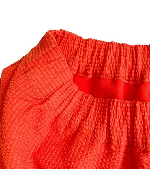 Arto. Red Summer Cotton Textural Smocking Midi Skirt