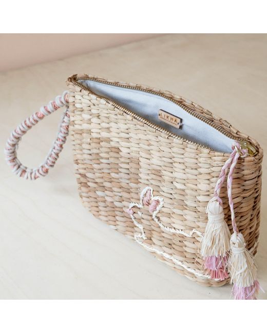 LIKHÂ Brown Neutrals Handwoven Seagrass Bunny Wristlet Pouch With Tassels