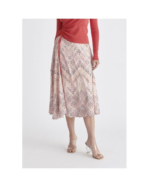 Paisie Asymmetric Hem Skirt In Pink, Red, Black & Cream