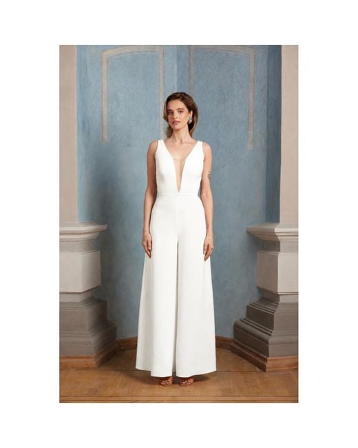 Nomi Fame White Primrose Deep V-Neck Creamy Palazzo Jumpsuit