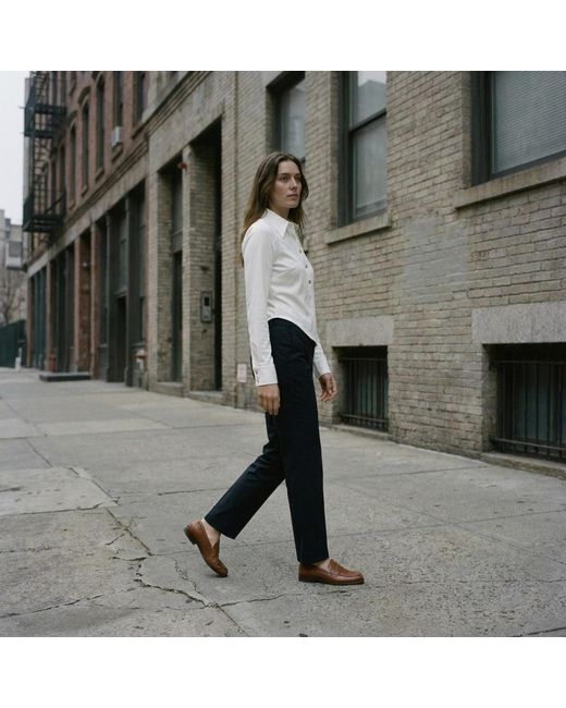Modenaire White Collared Button Front Blouse With Asymmetrical Hem Detail