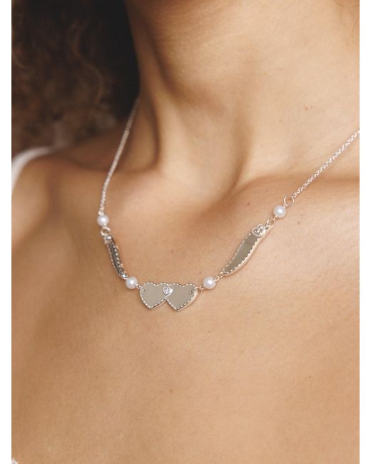 Déclarer Metallic Wings Of Love Necklace