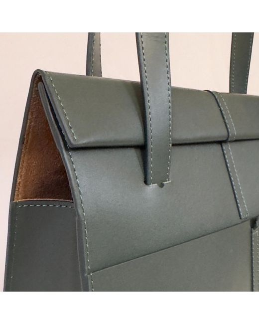 godi. Black The Roon Top Handle Leather Bag