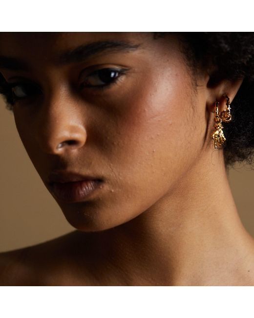 Kasun Metallic Hand Of The Protector Earrings for men