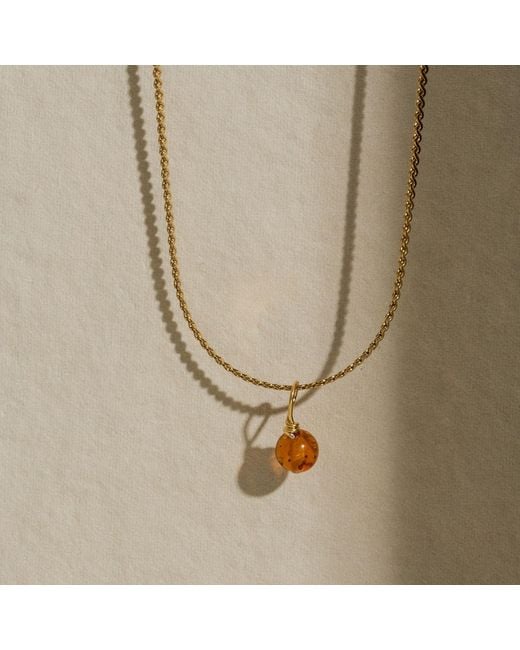 A Weathered Penny Metallic Amber Necklace