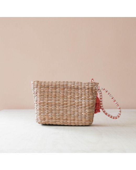 LIKHÂ Red Neutrals Handwoven Seagrass Tomato Wristlet Pouch With Tassels