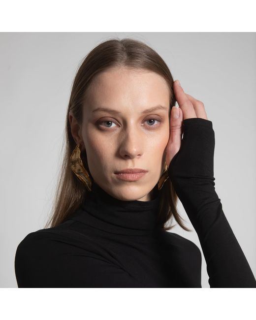 Una Berzina Black Turtleneck