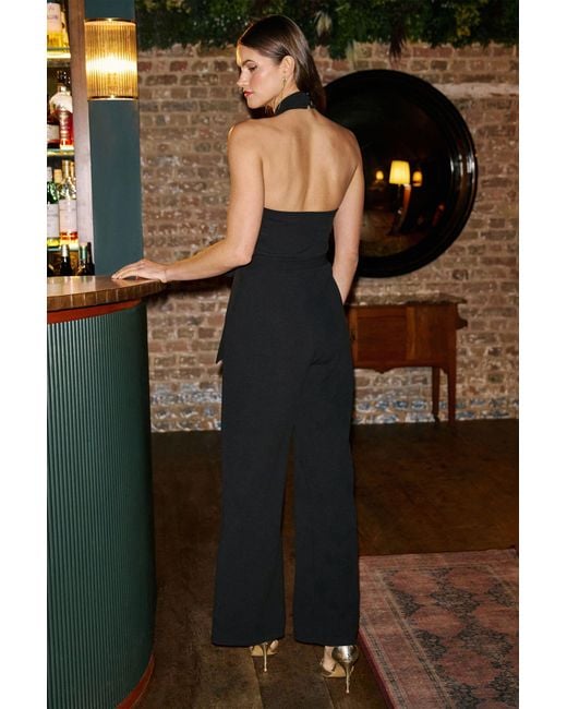 Yumi' Black Cross Over Halter Neck Jumpsuit