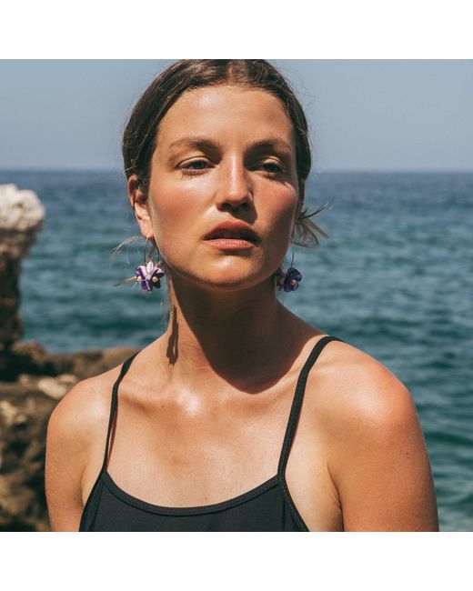 By Chavelli Purple Flowerball Dangly Earrings