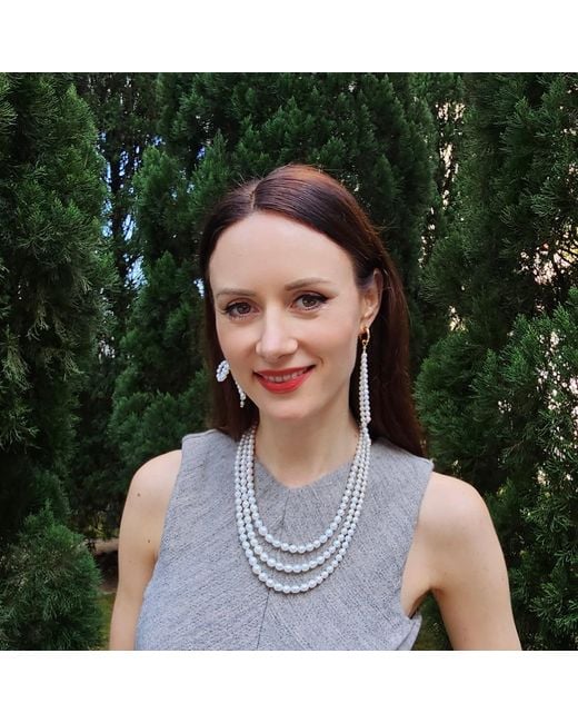 Farra White Freshwater Pearls Butterfly Knot And Tassel Asymmetric Earrings