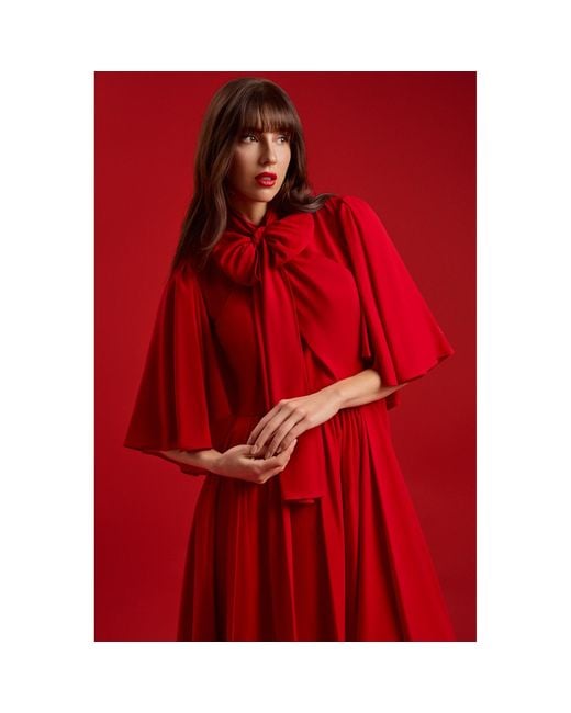 Femponiq Red Bow Tie Neck Cape Sleeve Maxi Dress