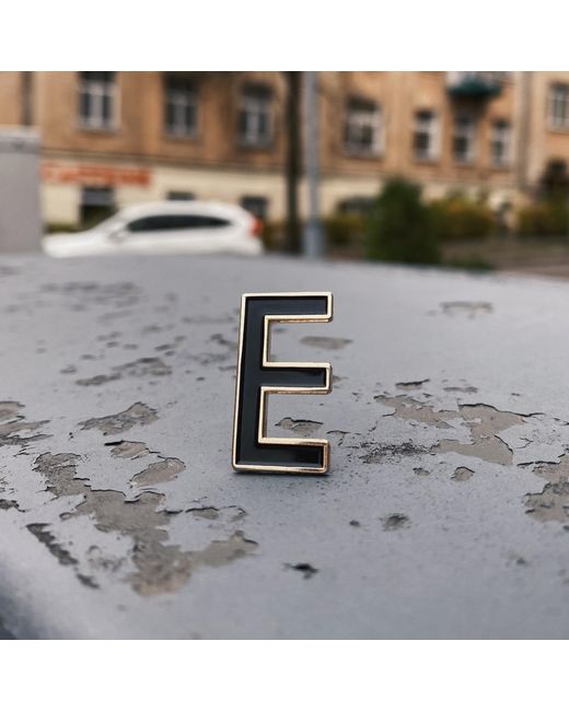 Make Heads Turn Black Enamel Letter E Pin