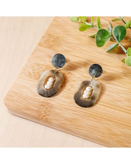 LIKHÂ Black Oval Earrings With Inner Pearls