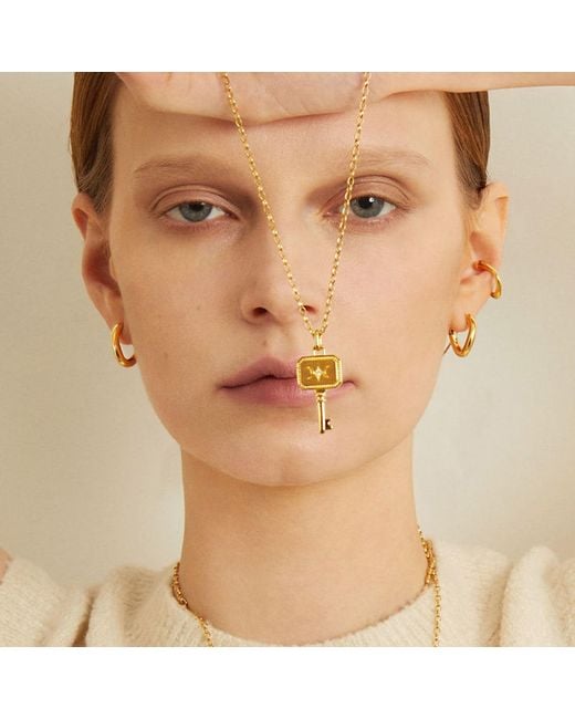 Cote Cache Metallic Slight Twist Huggie Hoop Earrings