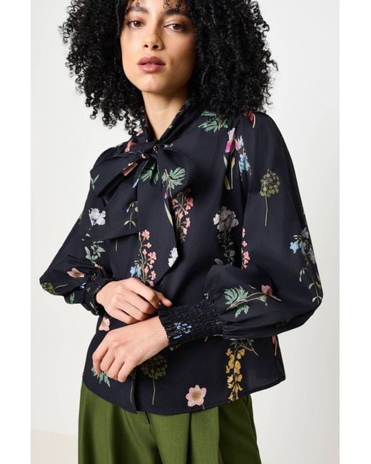 Louche Blue Aditi Flower Press Print Tie Neck Blouse